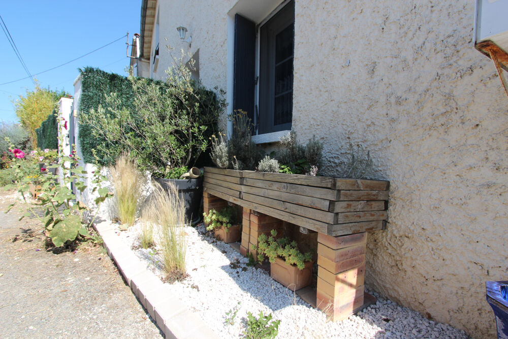 MAISON EN PIERRE AVEC TERRASSE HANGAR PARKING