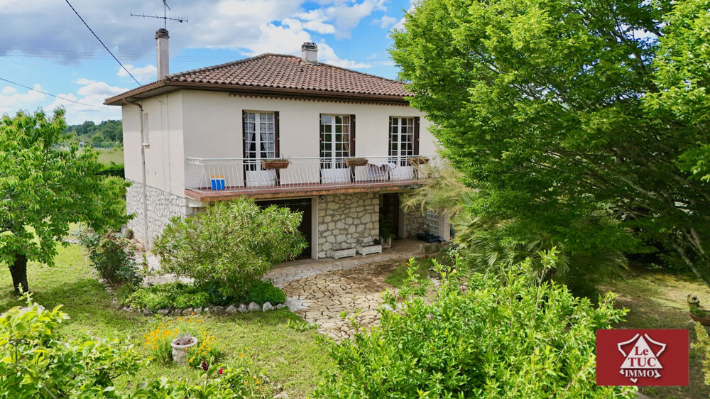 Maison 4 chambres avec garage et dépendance.