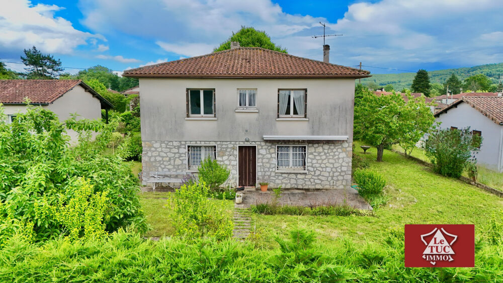 Maison 4 chambres avec garage et dépendance.