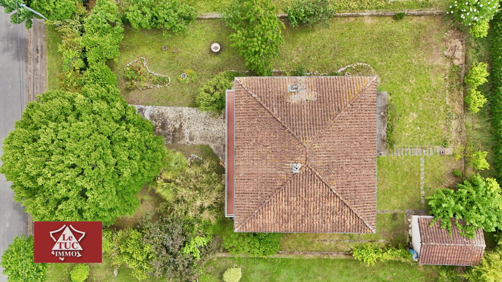 Maison 4 chambres avec garage et dépendance.