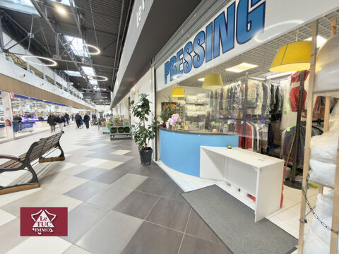  Pressing dans un hypermarché 