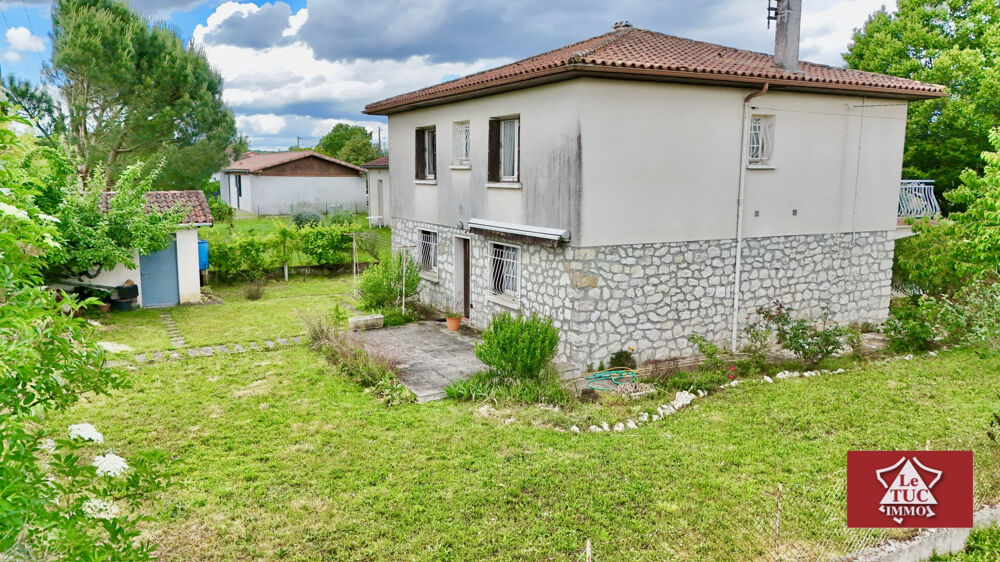 Maison 4 chambres avec garage et dépendance.