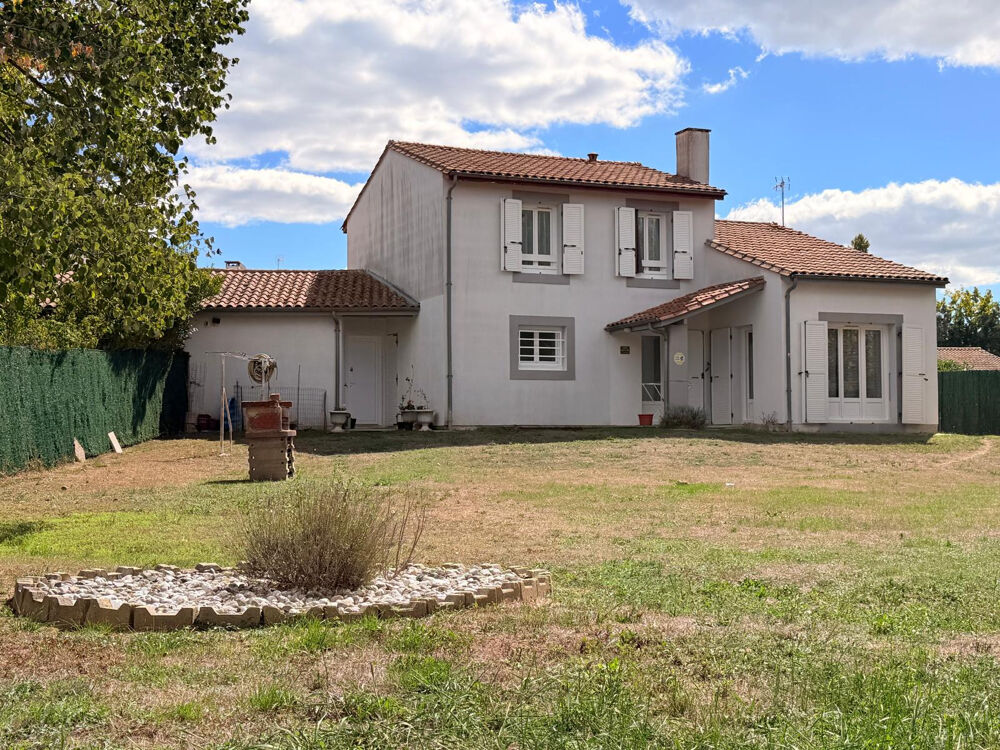 Maison familiale 100 m2 avec 3 chambres, garage et terrain