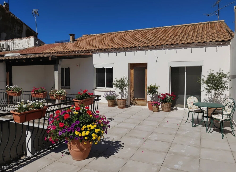 Appartement rénové 4 pièces avec grande terrasse et garage