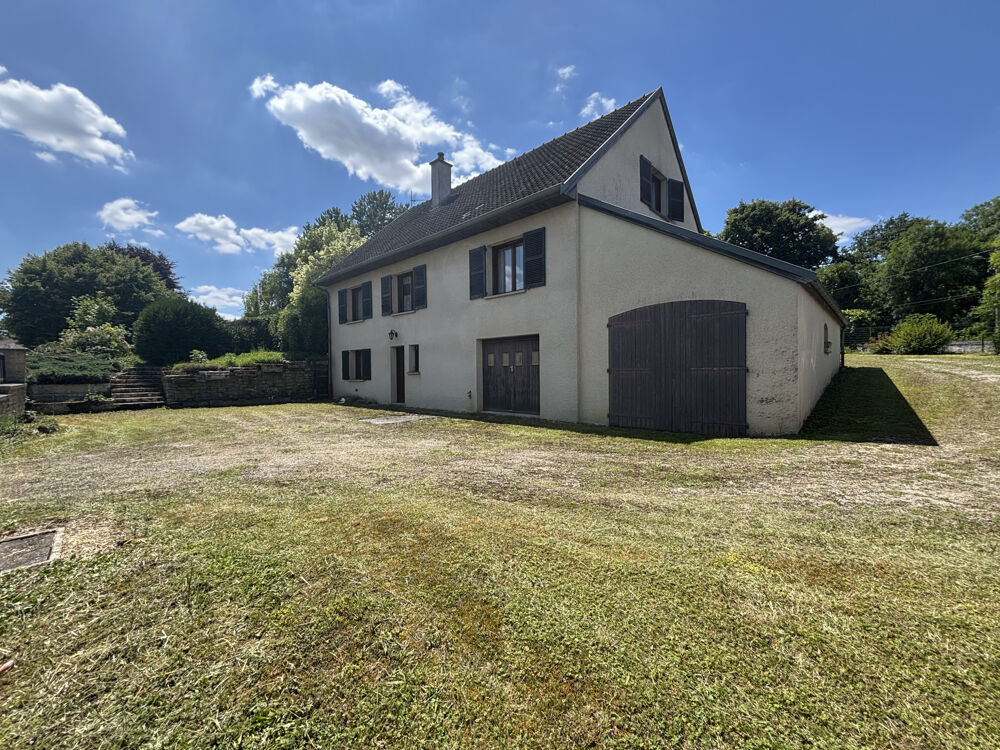 LAIGNES (21) maison de 205m2 ,année 1980 ,avec sous-sol , garages et terrain de 2000m2 proche de l'autoroute.
