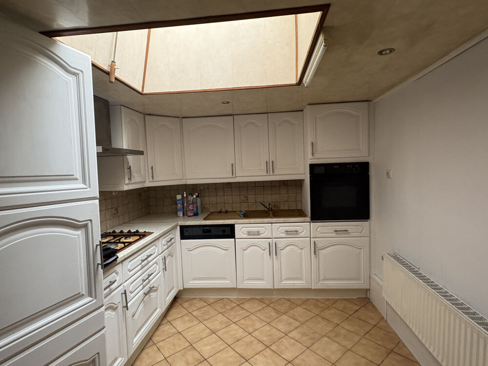 TRITH SAINT LEGER, maison d' environ 98m2, 2 chambres, jardin, garage.