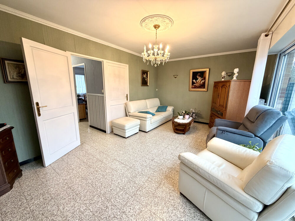 Maison d' environ 90m2, 4 chambres, jardin etn garage.