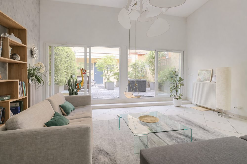 Appartement loft familial de 244 m2 avec patio et garage