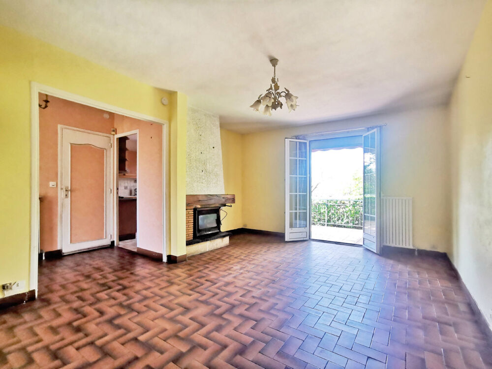 MAISON INDIVIDUELLE DE PLAIN-PIED avec sous-sol total sur 1000m2 de terrain arboré