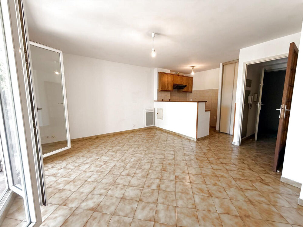 APPARTEMENT T2 AVEC TERRASSE ET PARKING A 2 PAS DU CENTRE VILLE