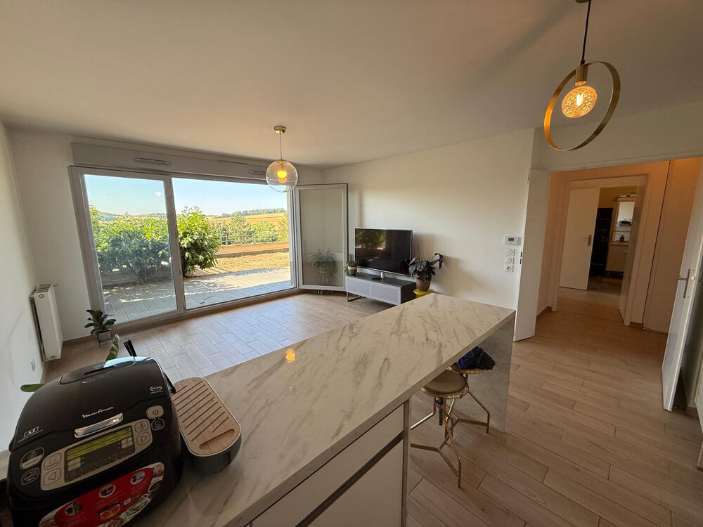 Vue splendide pour cet appartement à CRECY LA CHAPELLE, trois pièces de 57.84 m2 avec jardin