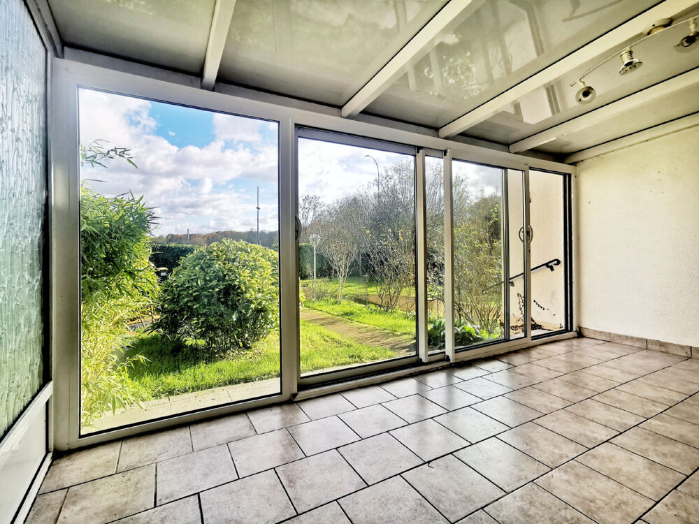 MAISON INDIVIDUELLE DE PLAIN-PIED avec sous-sol total sur 1000m2 de terrain arboré