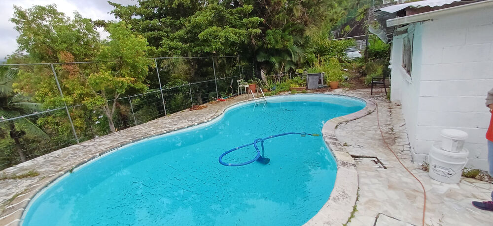 Vente Maison Grande case F6 Tomy de 170 m2 avec piscine sur 1464 m2 de terrain arboré St denis