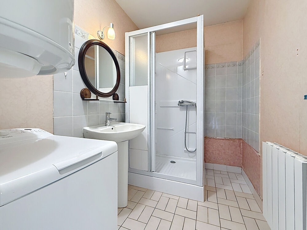 Appartement 70 m2, 2 chambres, séjour, cuisine, salle d'eau et garage