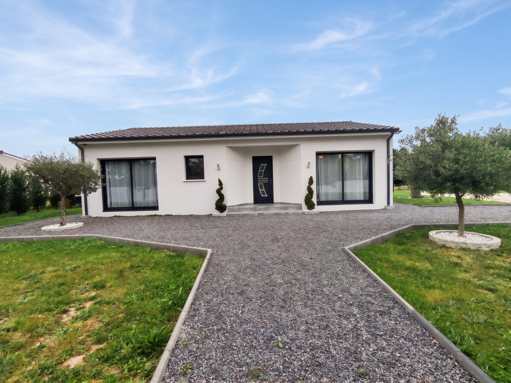 Découvrez cette magnifique villa contemporaine de plain-....