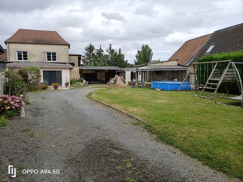 Maison familiale avec garage, carport et dépendances Terrain 1 108 m2