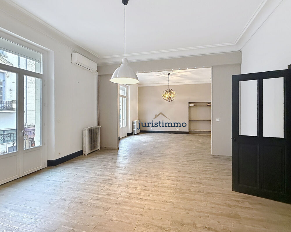 BEL APPARTEMENT HAUSMANIEN LUMINEUX DE 158M2 AVEC TERRASSE COUVERTE