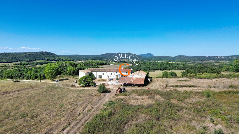 Vente Maison A vendre proche Uzès, ancienne propriété viticole en pierre sur terrain de 28 160 m2. Uzes