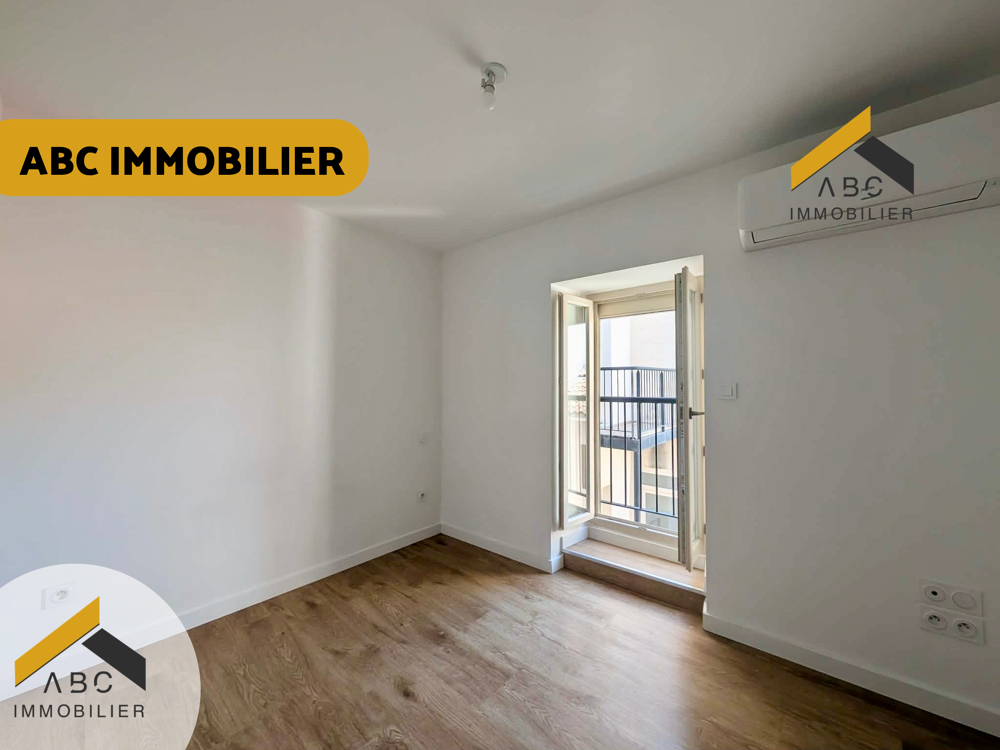 APPARTEMENT T2 - IMMEUBLE AVEC ASCENSEUR - REFAIT À NEUF