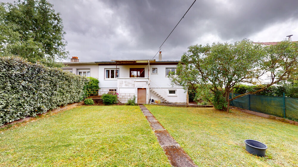 Maison T5 avec grand garage et jardin