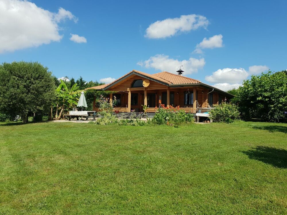 Vente Maison À vendre, proche de Trie-sur-Baïse (Gers) - Charmant chalet de plain-pied avec sauna, abris voitures, atelier, jardin paysager. Montaut