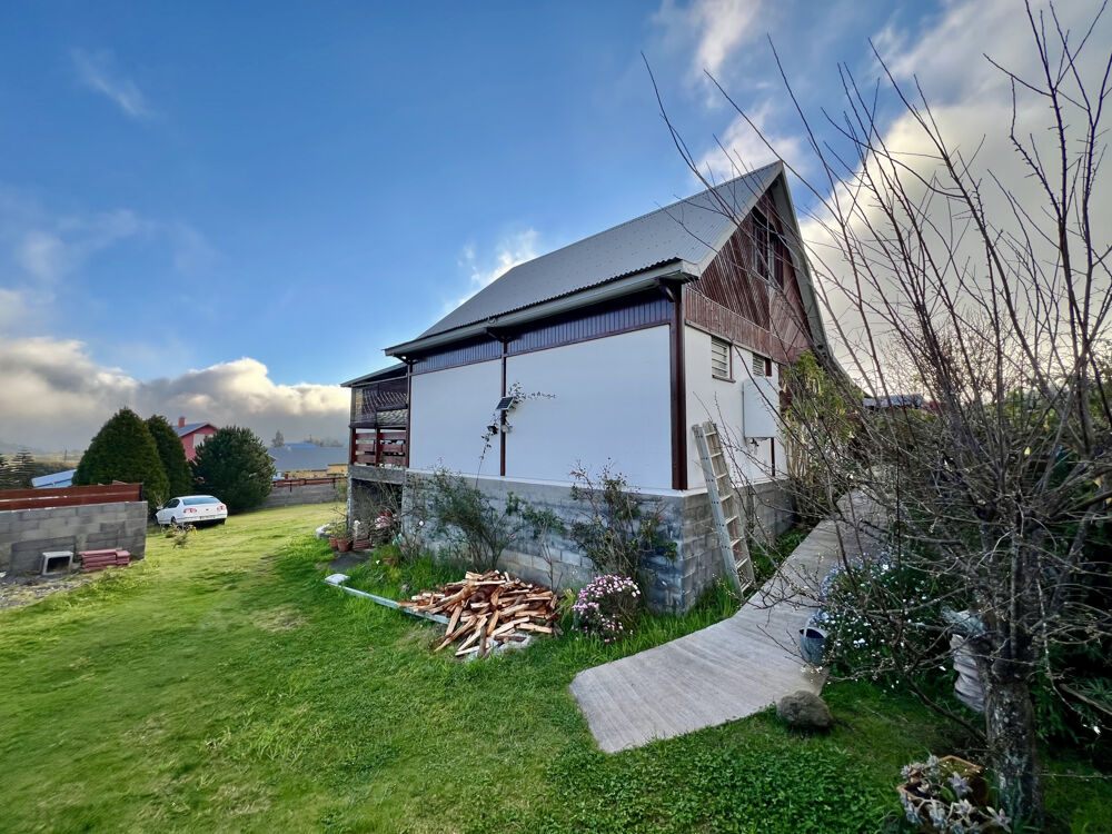 Vente Maison TAMPON 97430 - VILLA F4 TYPE CHALET - PARFAITEMENT ENTRETENUE - CADRE BUCOLIQUE - VASTE TERRAIN PLAT Le tampon