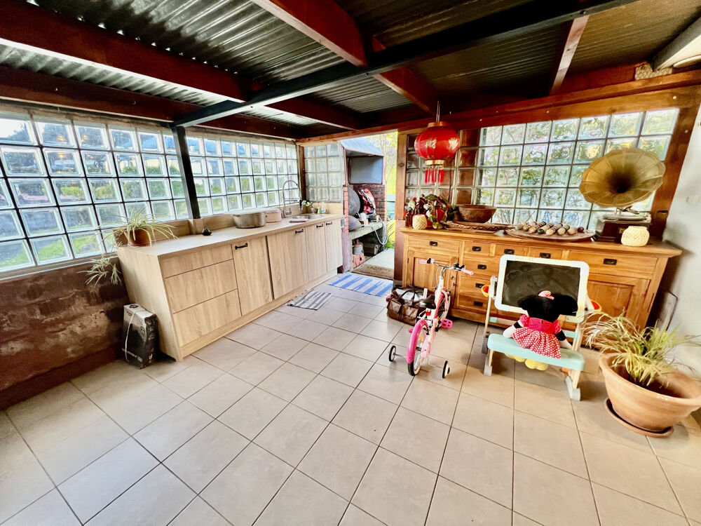 Vente Maison TAMPON 97430 - VILLA F4 TYPE CHALET - PARFAITEMENT ENTRETENUE - CADRE BUCOLIQUE - VASTE TERRAIN PLAT Le tampon