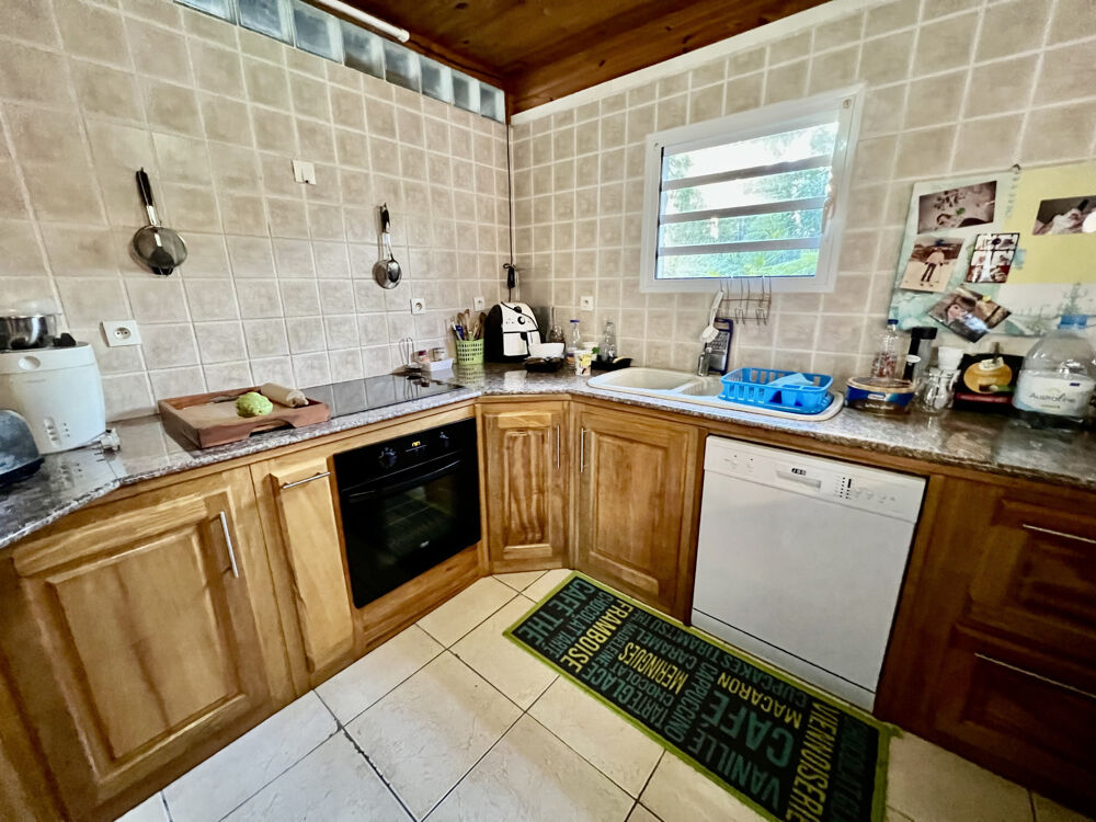 Vente Maison TAMPON 97430 - ENSEMBLE IMMOBILIER - VASTE PARCELLE - REVENU LOCATIF - ENVIRONNEMENT VERDOYANT Le tampon