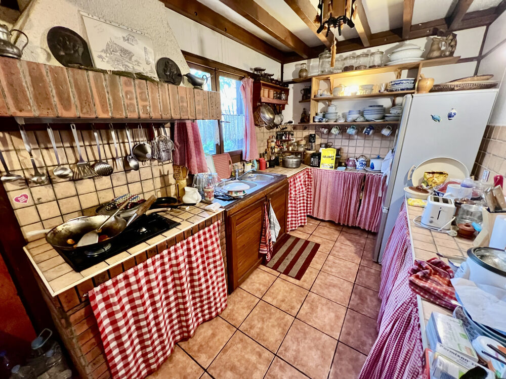 Vente Maison TAMPON 97430 - VILLA F4 TYPE CHALET - PARFAITEMENT ENTRETENUE - CADRE BUCOLIQUE - VASTE TERRAIN PLAT Le tampon