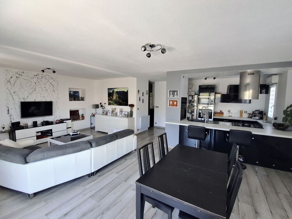 Appartement 3 pièces avec grand jardin, garage et stationnements