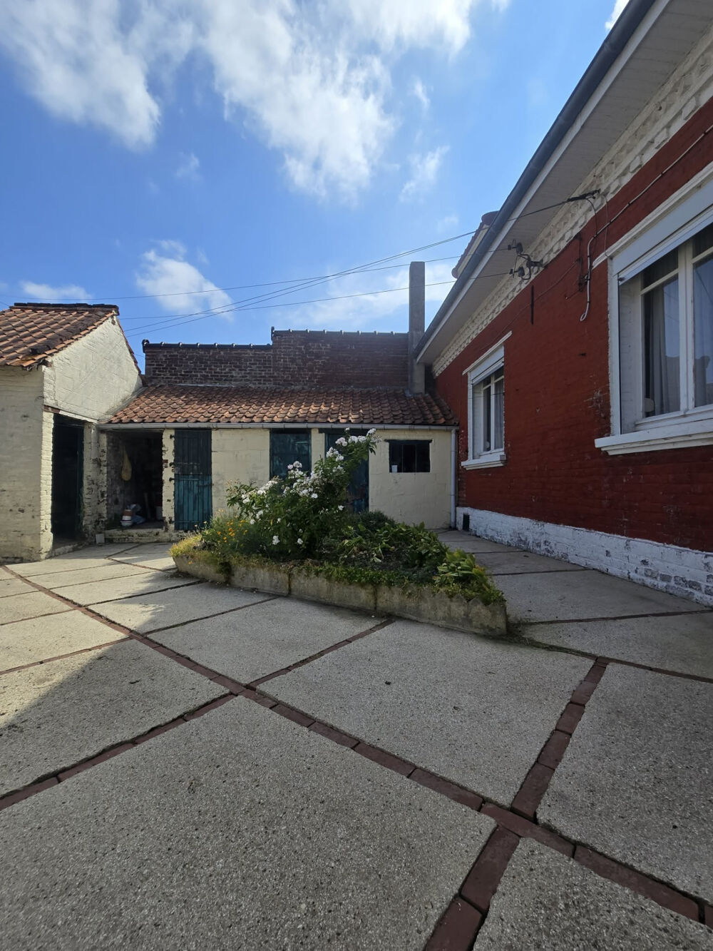 Maison semi-individuelle avec jardin