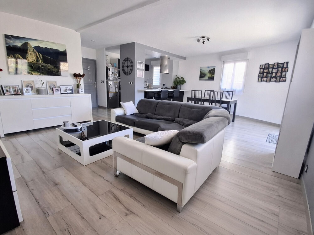 Appartement 3 pièces avec grand jardin, garage et stationnements