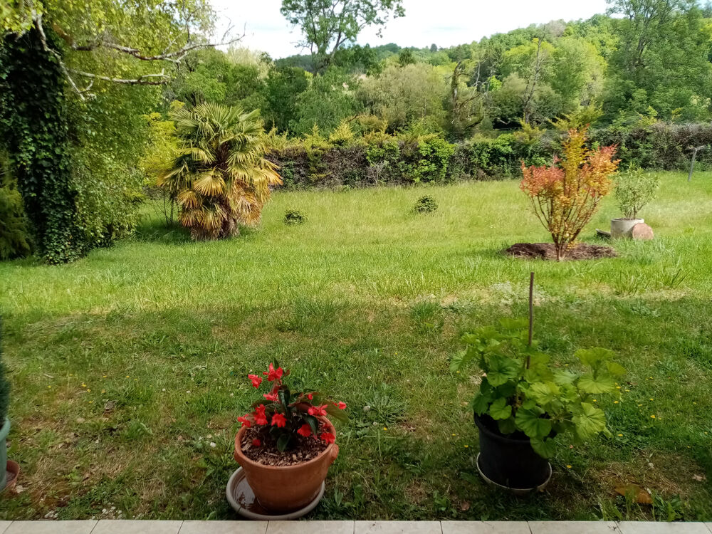 Maison de plain-pied sur sous-sol avec appartement en rez-de-jardin sur terrain 6000 m2