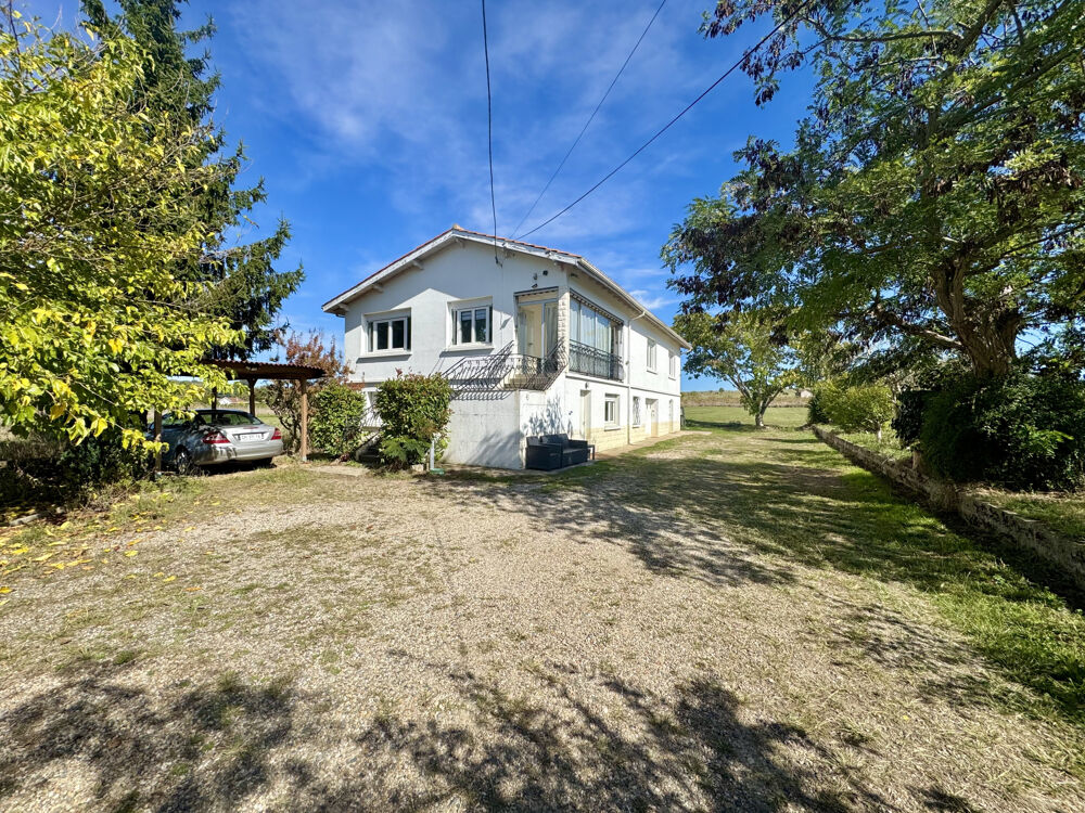 Maison années 70's de 150 m2 et son grand terrain clôturé au calme