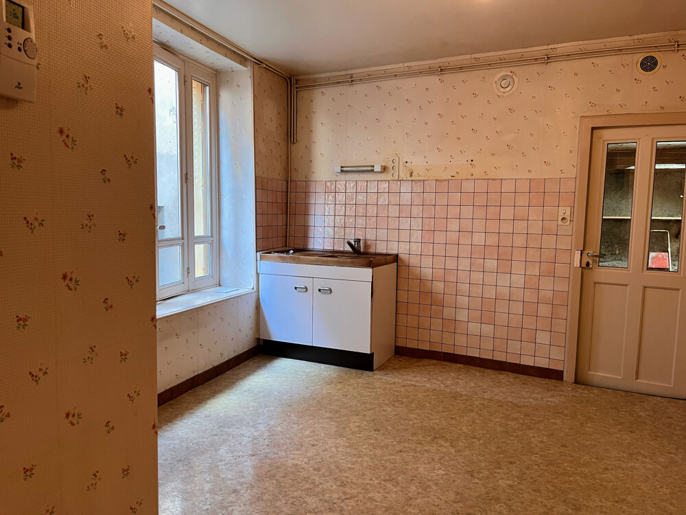 MAISON DE BOURG AVEC GARAGE, TERRASSE ET ANNEXE