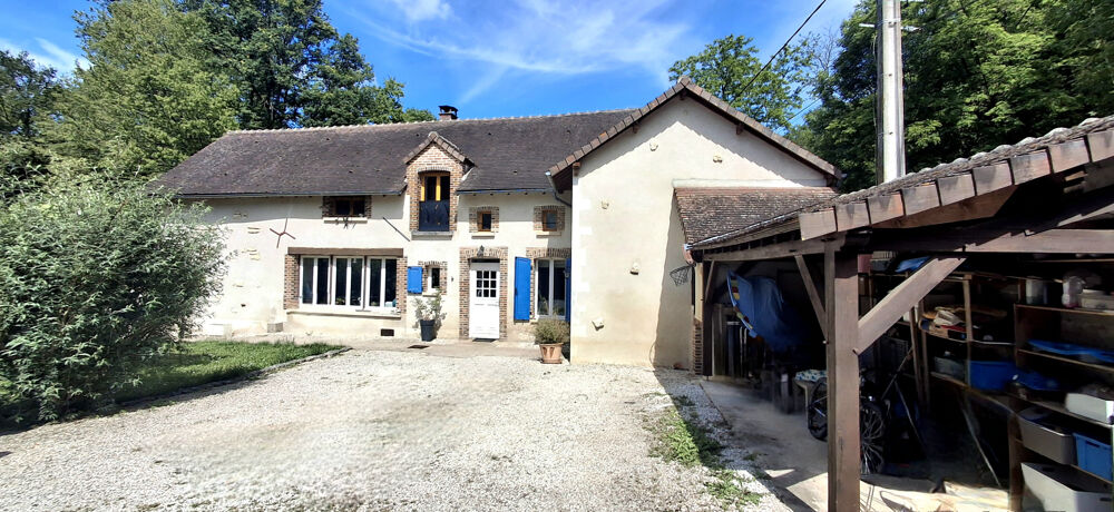 Maison de caractère bénéficiant dun environnement verdoyant et préservé.