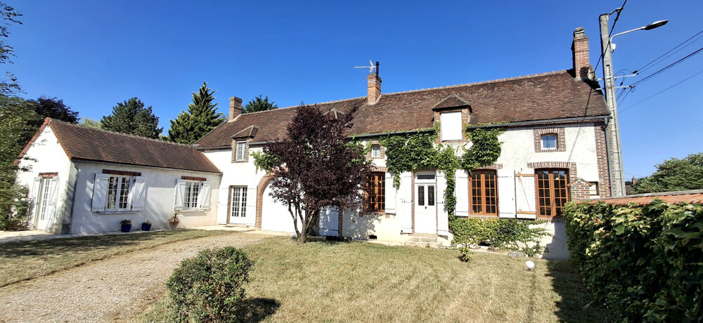 Propriété de charme avec dépendance et jardin arboré.