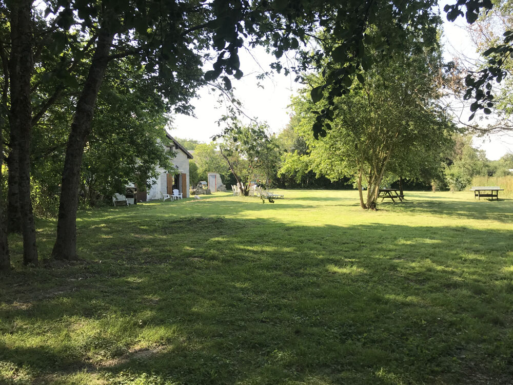 Maison sur terrain clos et boisé de presque 3000 m2.