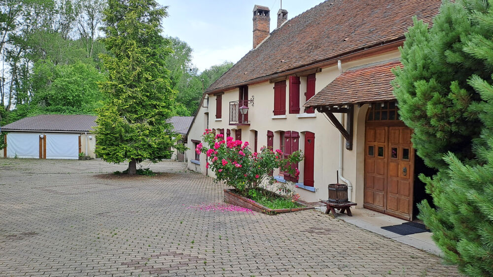 Ensemble de 2 maisons sur un magnifique parc