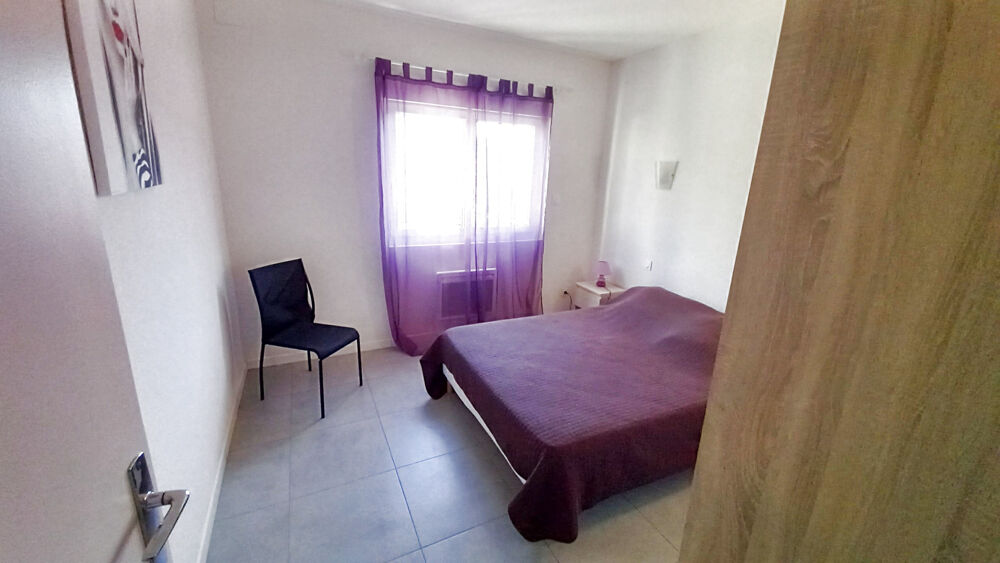 Grand Appartement T3 64 M2 + 2 caves .