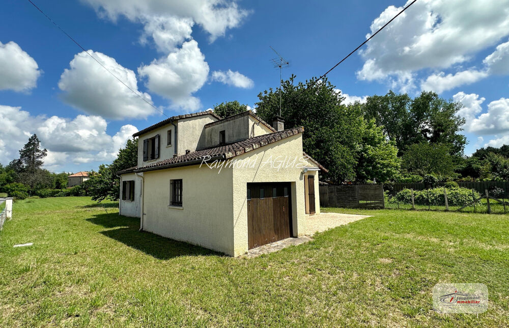 Charmante maison traditionnelle de 3 chambres avec grand jardin et garage spacieux