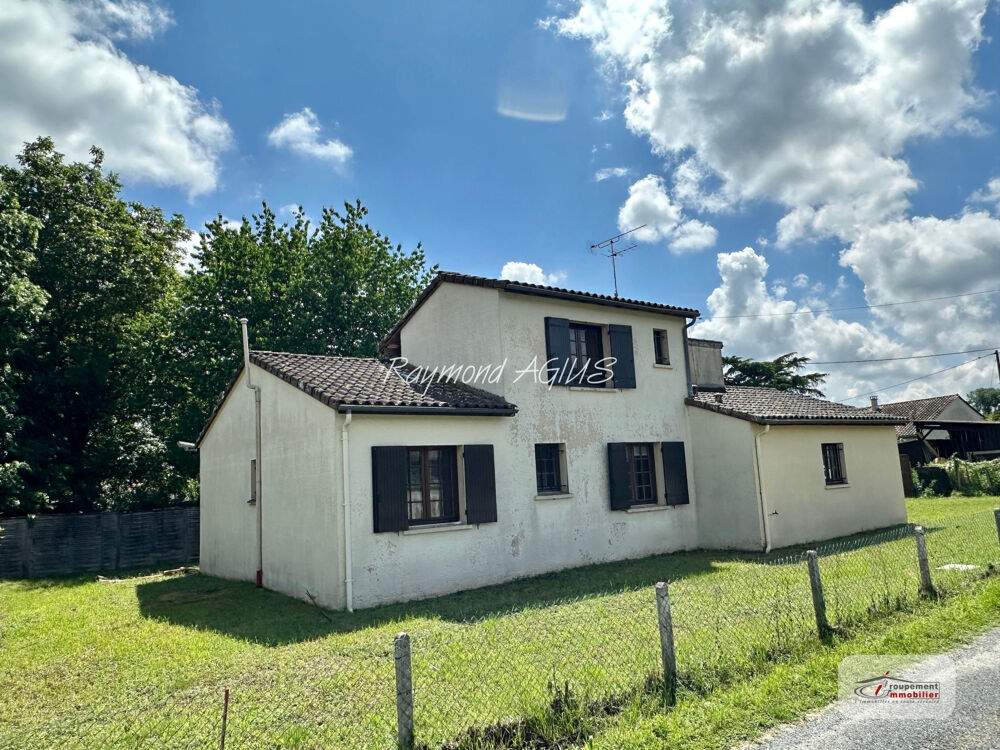 Charmante maison traditionnelle de 3 chambres avec grand jardin et garage spacieux