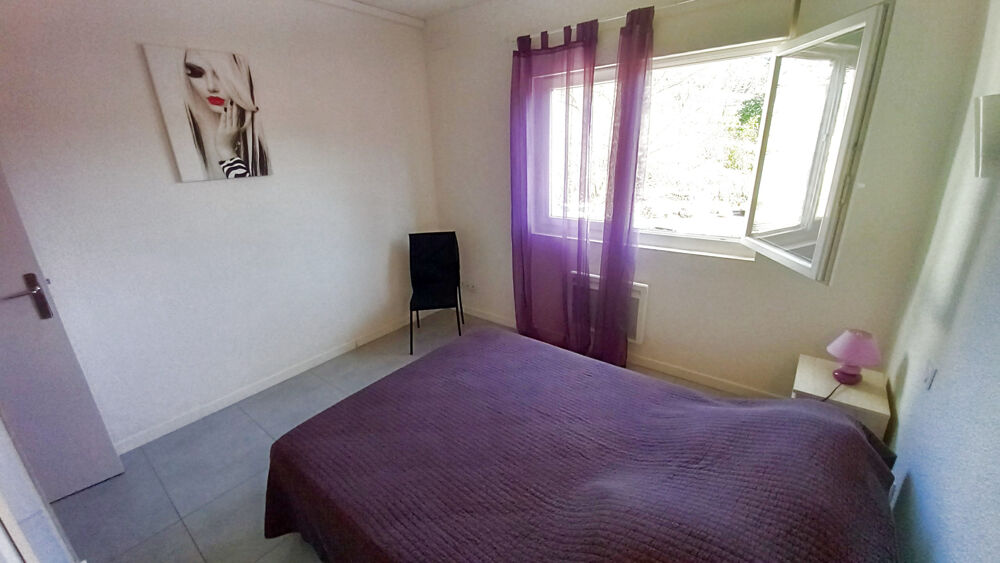 Grand Appartement T3 64 M2 + 2 caves .