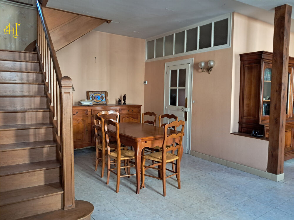 Maison comprenant trois logements