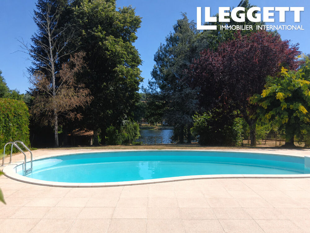Vente Maison Superbe propriété au bord de la rivière avec piscine, studio, 3 garages et terrain, à proximité du commerces Availles-limouzine