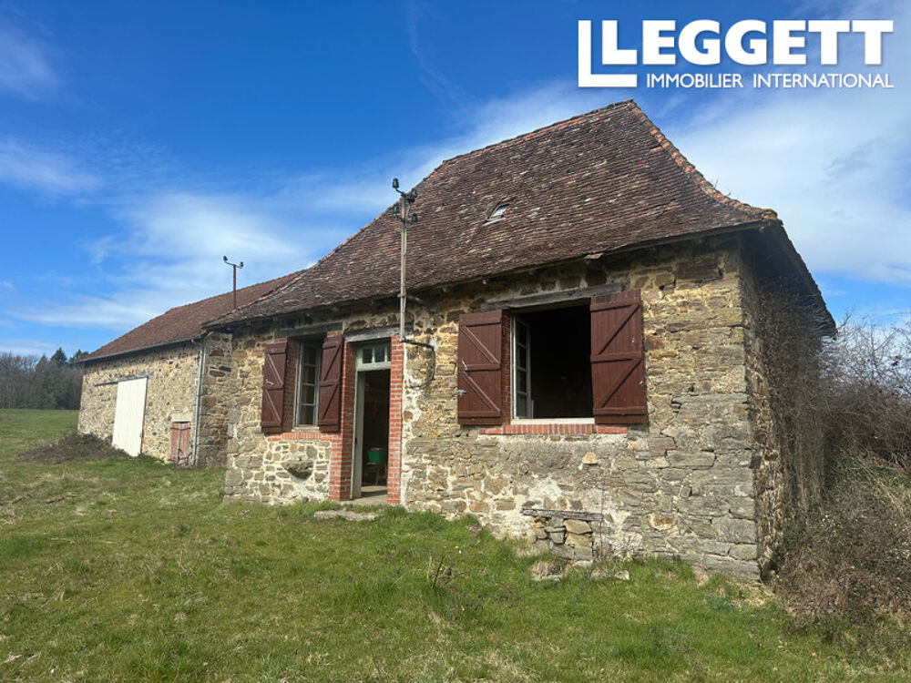 Beau lac avec maison et grange à rénover avec 9 Hectares Près de Ladignac-le-Long