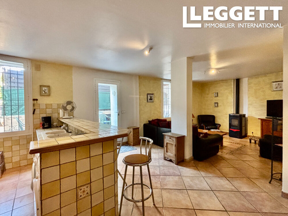 Élégante maison de village avec terrasse et local commercial