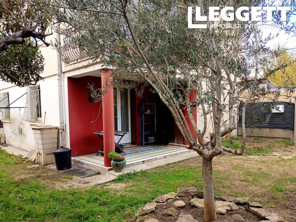 Avignon - 1ére ceinture - Appartement de 55m² avec cuisine, pièce à vivre, une chambre, sdb, jardin et garage.