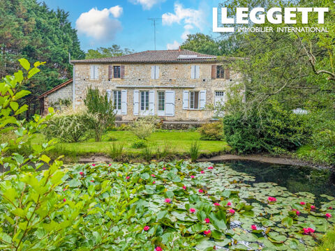   A 5mn de Montendre propri�t� en pierre de plain pied avec 3 chambres, un grand jardin priv� avec un �tang Maison - 5 pi�ce(s) - 163 m�