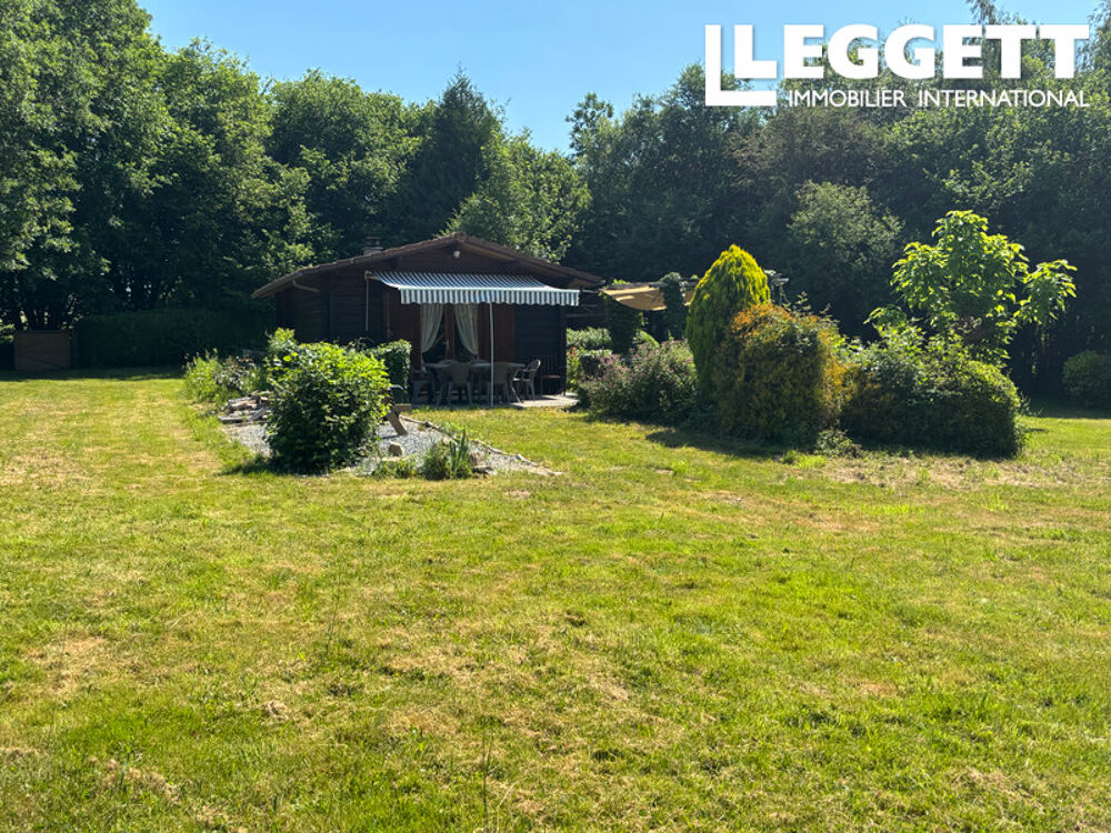 Vente Maison Un petit coin de paradis : un chalet en bois avec un étang de pêche, niché dans la magnifique campagne françai Ladignac-le-long